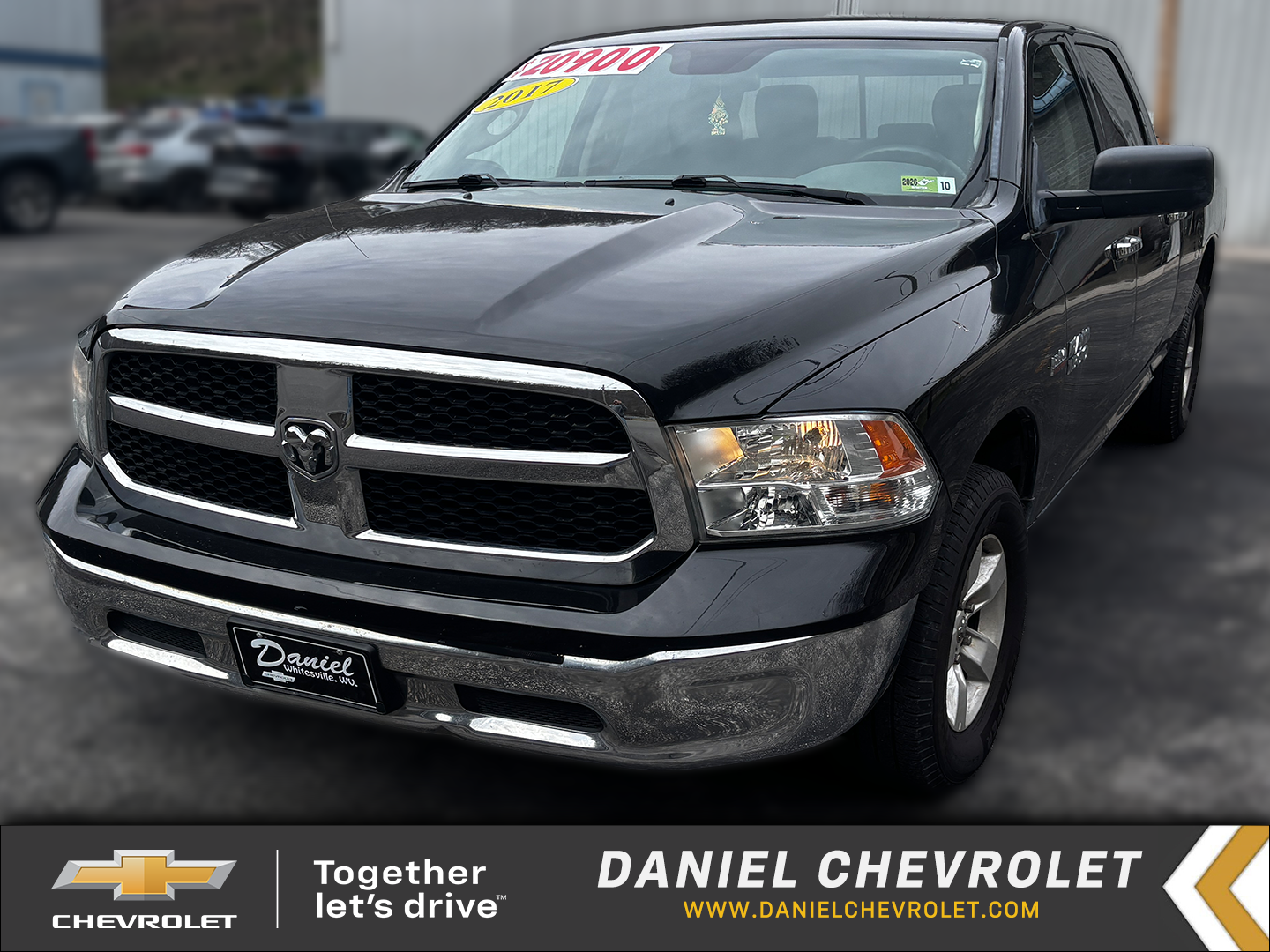 2017 RAM 1500 SLT in Black — front three-quarter view