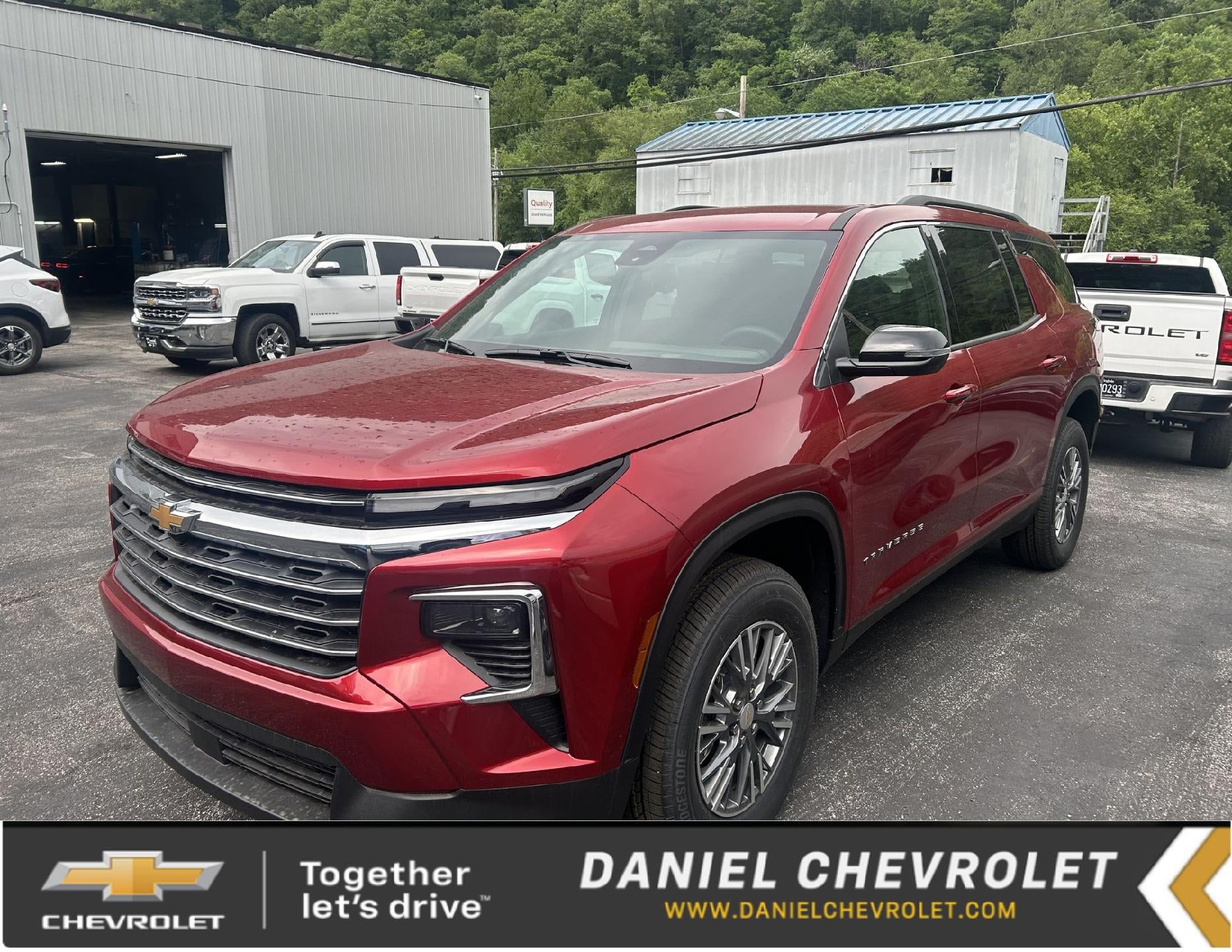 2026 Chevrolet Traverse LT in Radiant Red Tintcoat — front three-quarter view
